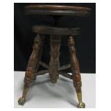 Wooden Rising Swivel Stool w/ Eagle Claw on Resin