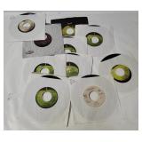 11 Assorted John Lennon 7' Singles
