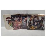 4 Aerosmith 7' Singles W/ Pic Sleeves