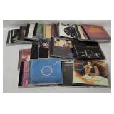 21 Rock Cd's - Santana, Eagles, Queen Etc.