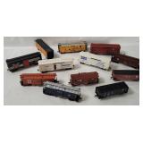 12 Assorted H O Scale Train Cars