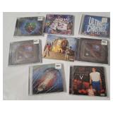 8 Sealed Cd's - Journey, Lil Wayne, Travis Scott