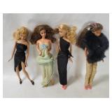 4 Assorted Barbie Dolls