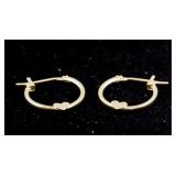 A Pair of 14K Gold Hoop Earrings