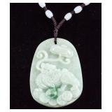 Chinese Greenstone Carved Lion Pendant with Cert