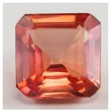 6.55ct Emerald Cut Pinkish Orange Sapphire GGL