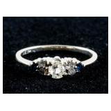 0.3ct Diamond and 0.03ct Dark Blue Sapphire Ring