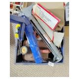 Two small gas cans, caulk guns and air hammer