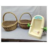Two large baskets and a cabbage patch seat