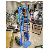 2 wheel dolly has rubber tires , tires are bad