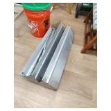 Two folding saw horses