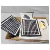 Old security camera and solar chargers