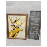 Old Iowa license plate and deer decor