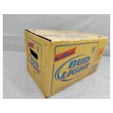 Empty beer bottles in Bud light box show