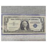 1957b $1 silver certificate blue seal