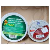 Two new rolls of aluminum foil tape