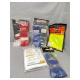 Reflective vest, racing gloves and tyvek suit