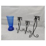Blue vase and three metal candle holders