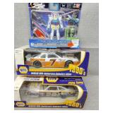 Two NASCARs and miscellaneous figure