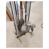 Seven fishing poles with holder no shipping