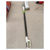 Plug in pole saw works handle almost 9 ft long