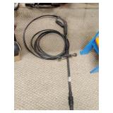 Pressure washer hose with handle
