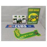 John Deere metal signs and plastic cubs sign