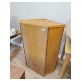 Angled wood cabinet