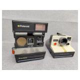 Two Polaroid cameras