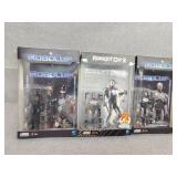 Three robo cop figures