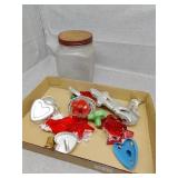 Cookie cutters and coffee glass jar