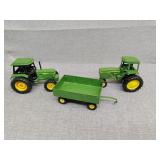 Three John Deere toys