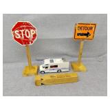 Train whistle, street signs and Winnebago