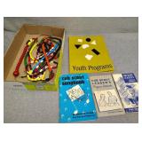 Boy scout books and wood necklaces