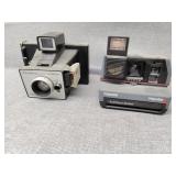 Two Polaroid cameras