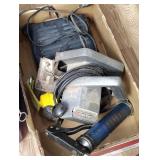 Skilsaw, hand grease gun, battery charger and
