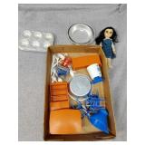 Small toy kitchen items and doll