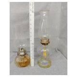 Two kerosene lamps one is lamplight farm