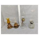 4 kerosene lamps right one is lamplight farm no