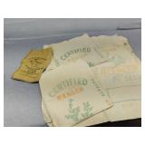 Three alfalfa cloth bags and popcorn small bag