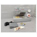 Singer sewing machine heavy duty with foot