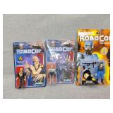 Three Robocop figures