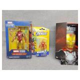 Three iron Man figures