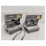 Two Polaroid cameras