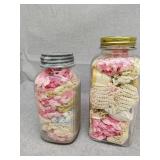 2 jars with linen items
