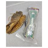 Vintage baseball glove and new shin guards