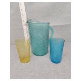 Glass pitcher  and two  glasses