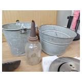 2.tin buckets and oil dispenser