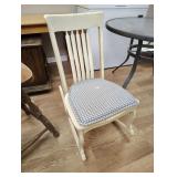 Wood rocking chair is cracked on seat