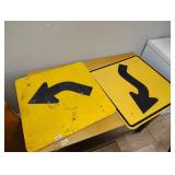 Two metal single-sided road signs